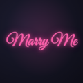 Néon LED Marry Me allumé sur mur sombre