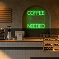 Enseigne néon LED Coffee Needed verte dans un café